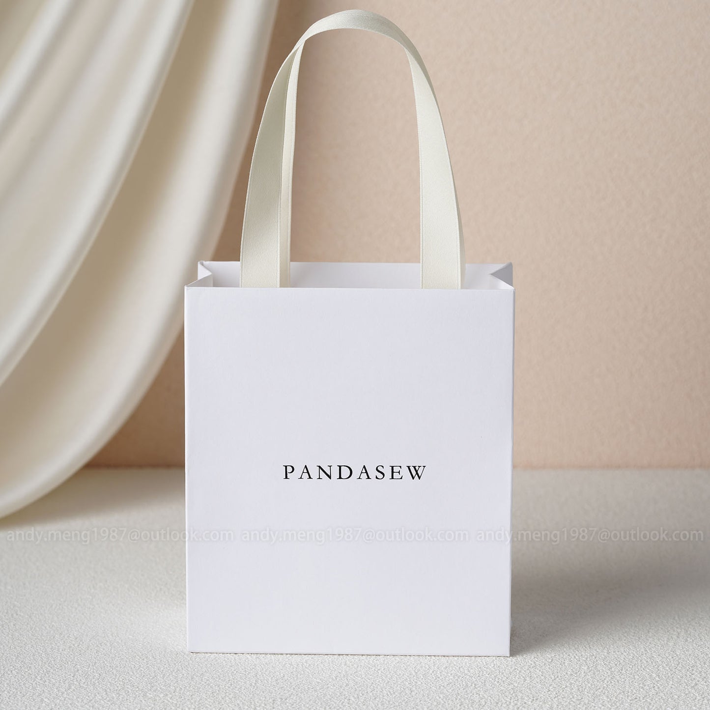 white paper bag with beige tote