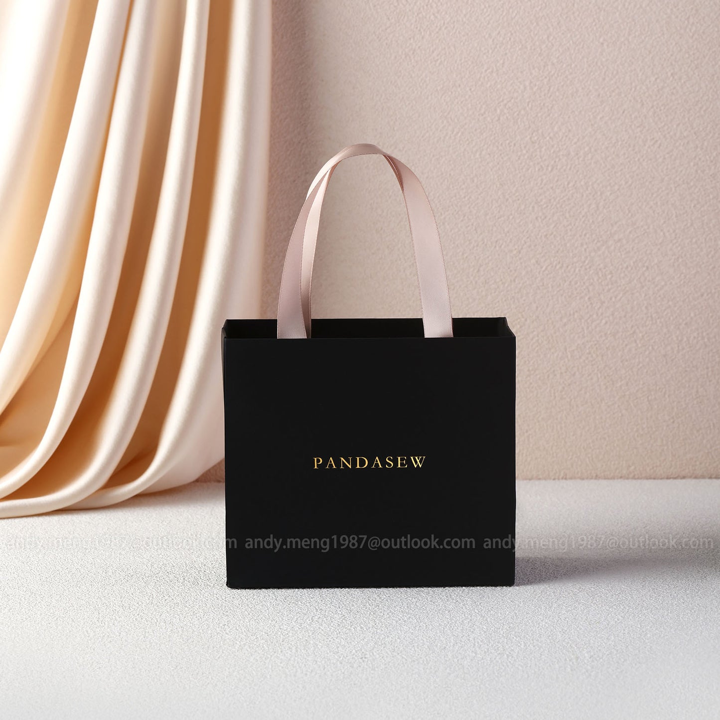 black paper gift bags with deboss logo