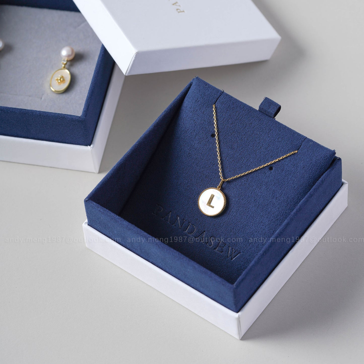 navy blue jewelry box with jewelry pad for necklace and earring