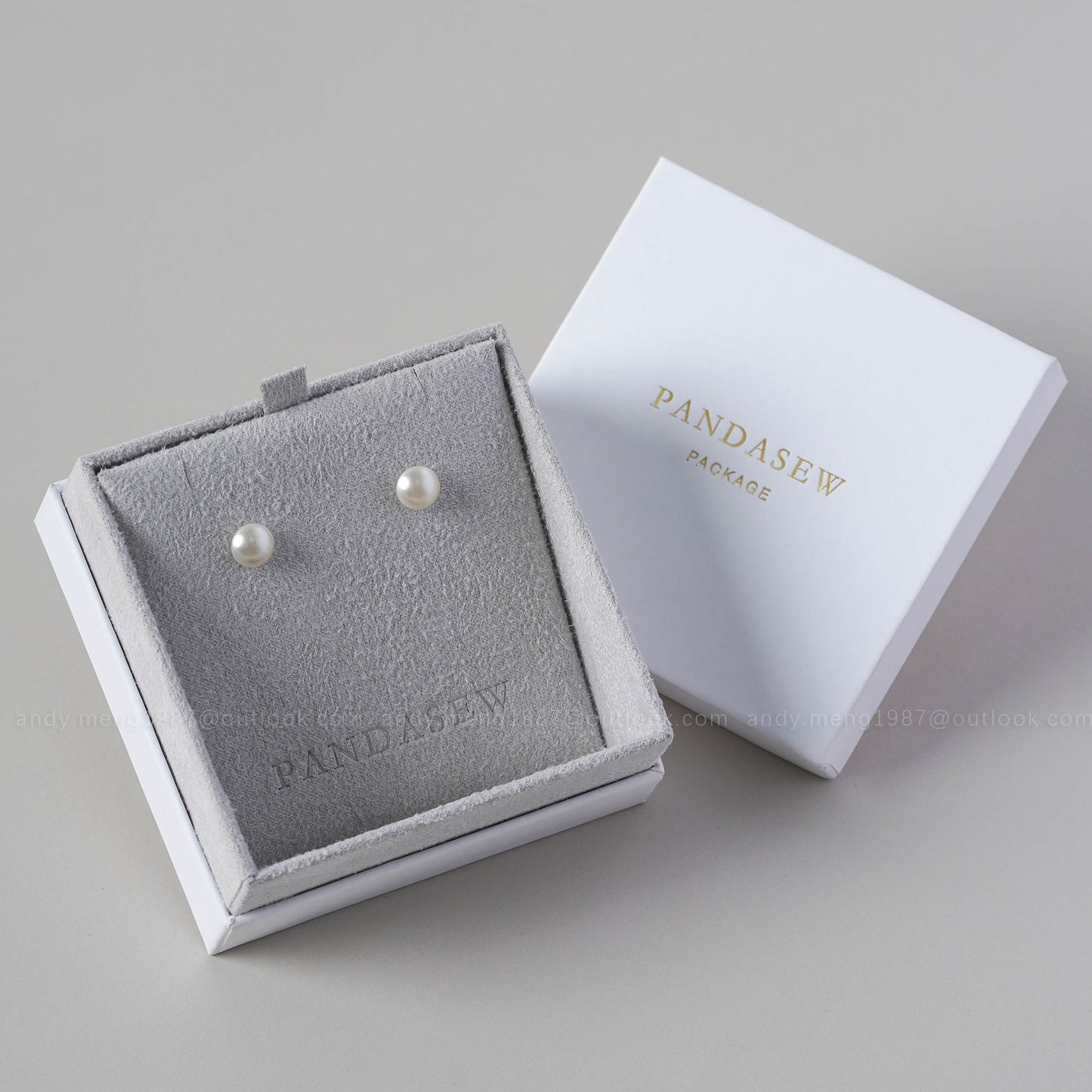 gray jewelry box with jewelry pad for necklace and earring