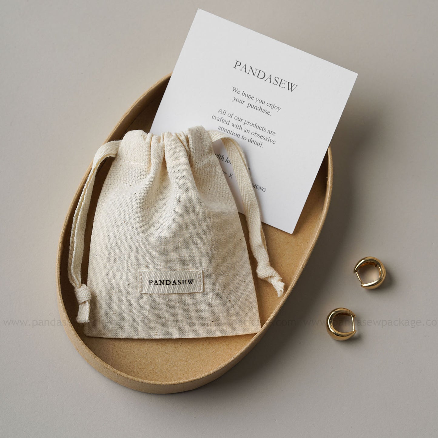 PANDASIEW Handmade jewelry presented in stylish, reusable cotton bags. Perfect for jewelry lovers, gift pack