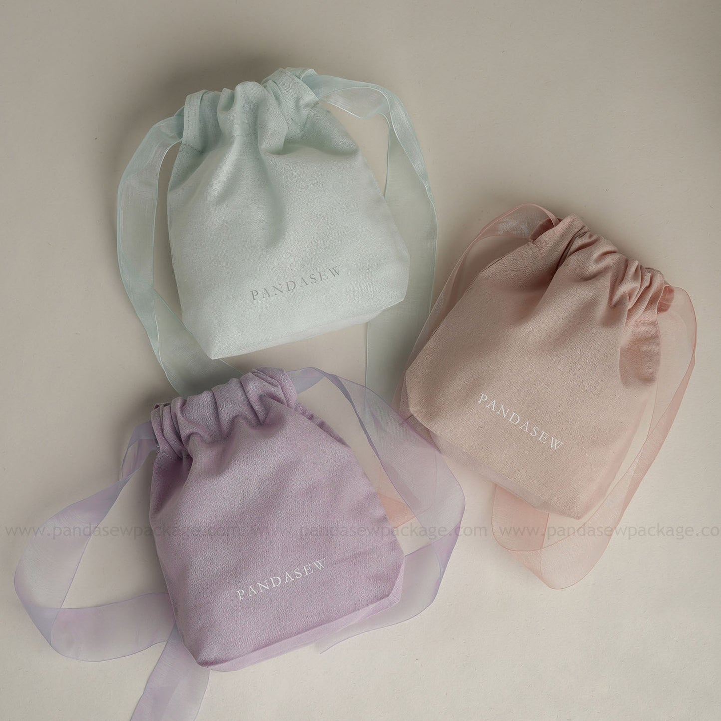 cotton drawstring bag in purple pink and blue