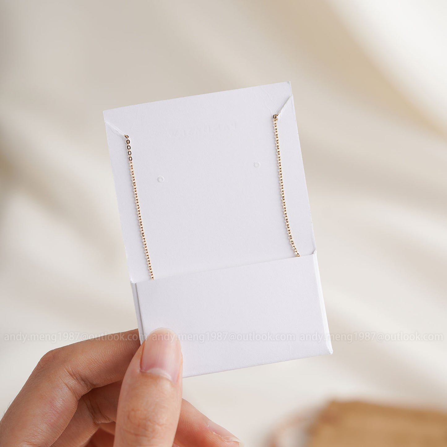 back side of 5.5x 8 cm necklace card