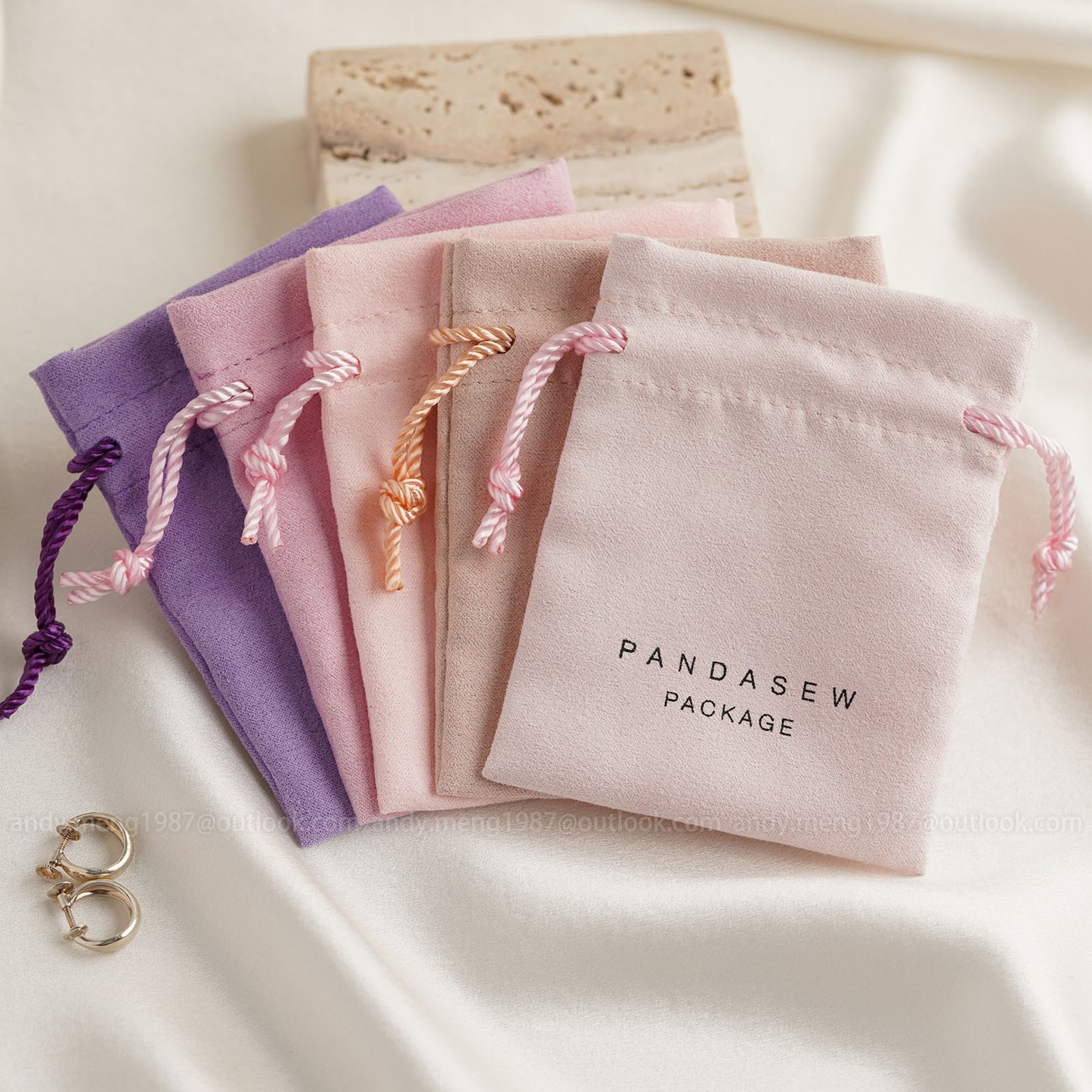 Pink drawstring pouches with logo