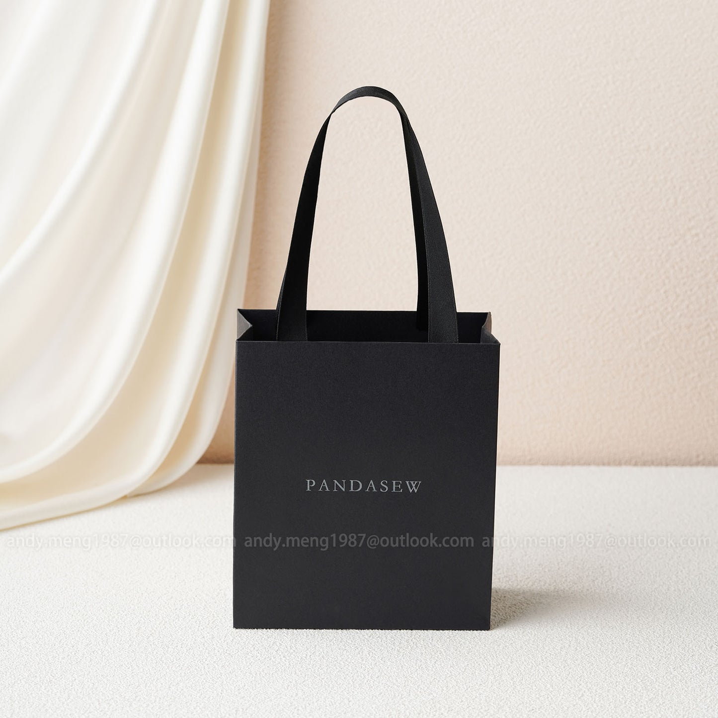 black paper gift bags with deboss logo