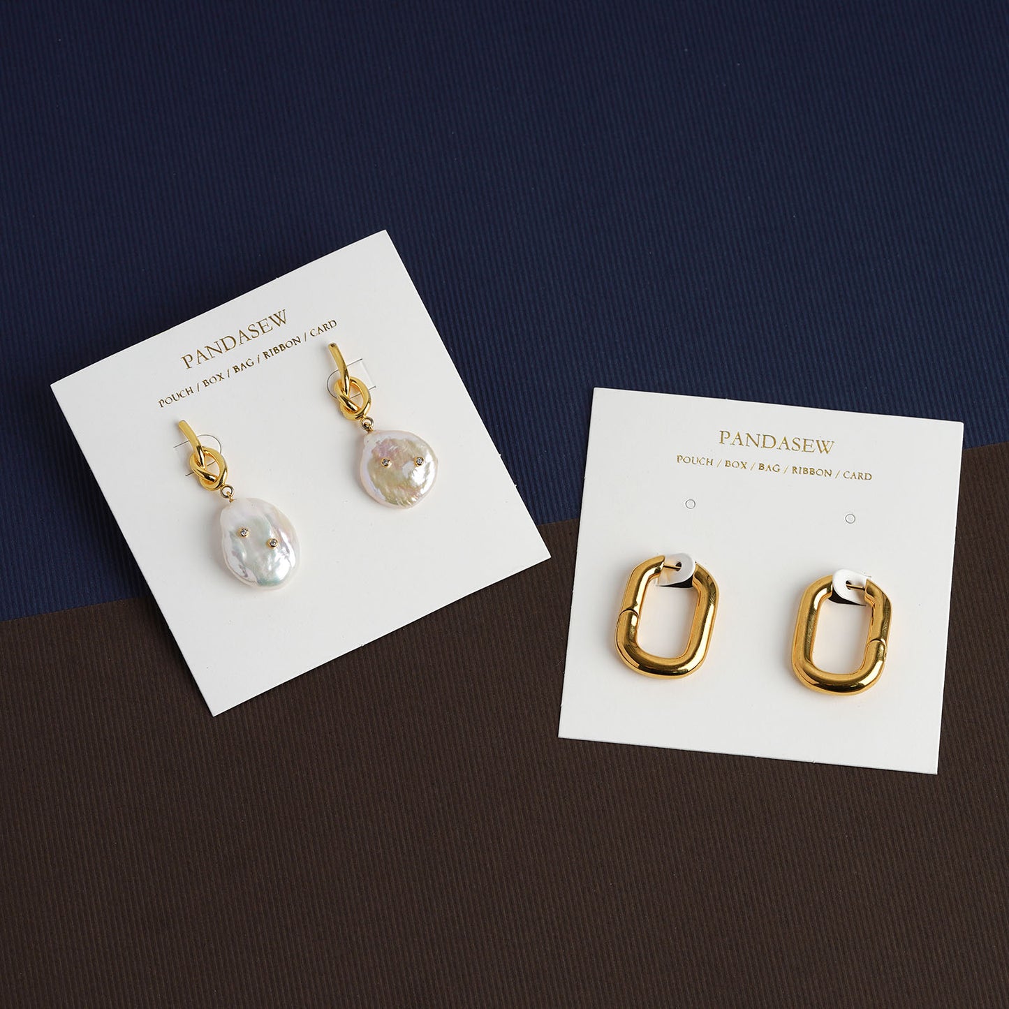 white earring display card with gold logo