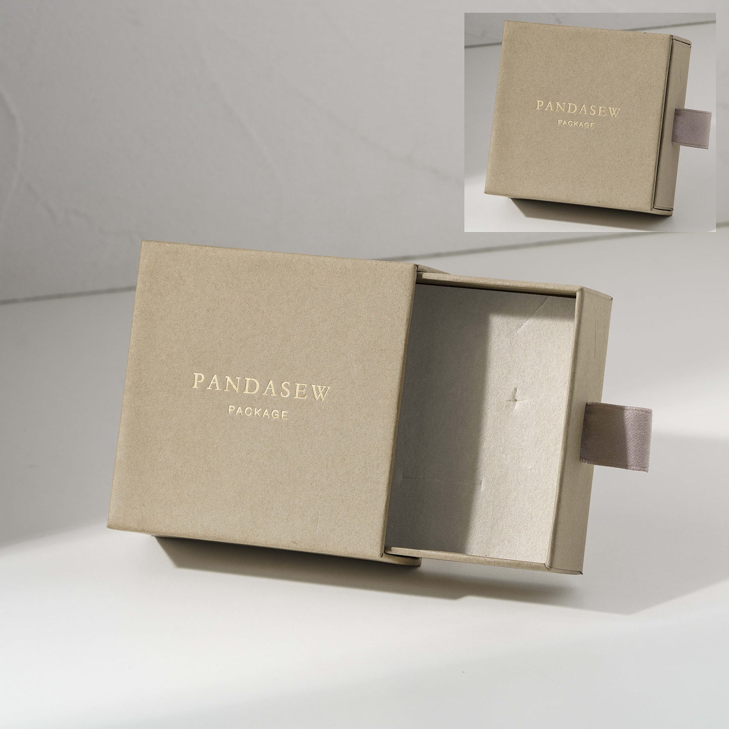 Khaki jewelry box with custom gold logo