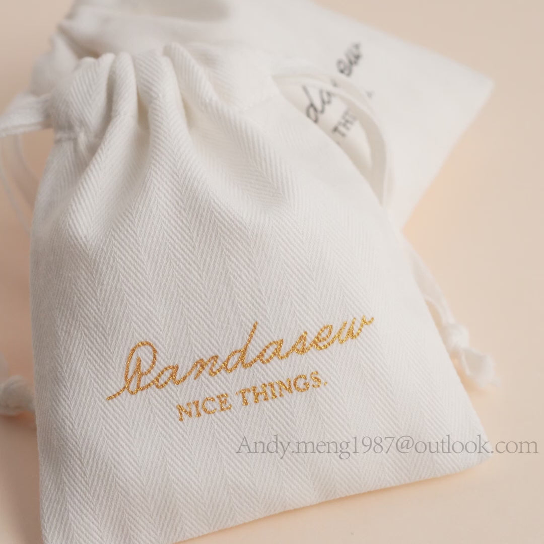 gold logo printed on white herringbone twill cotton package bag for  products