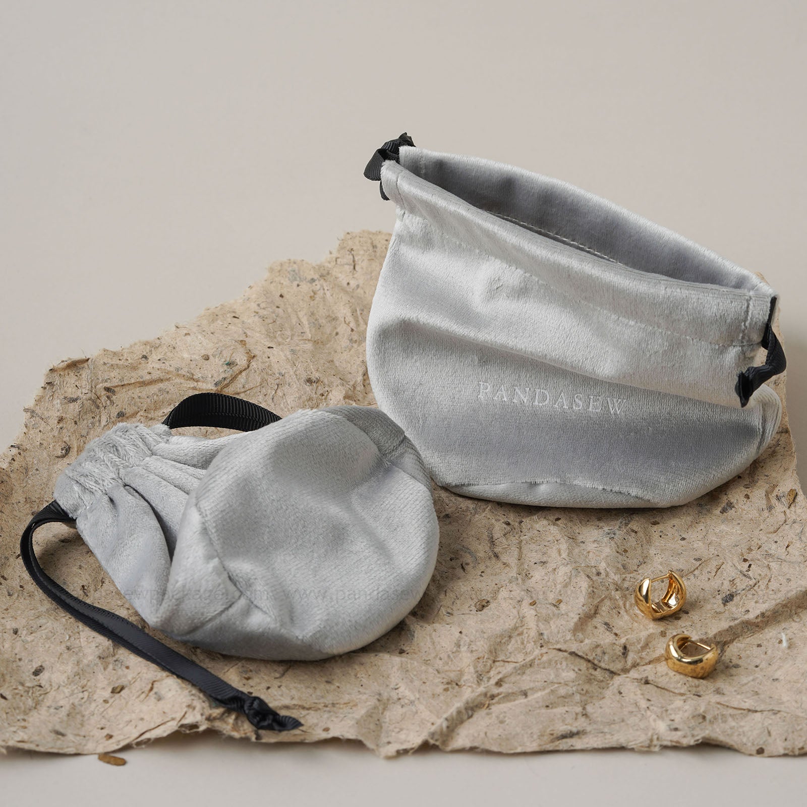 Soft velvet drawstring candle bags, black straps. Luxury gift packaging for small candles