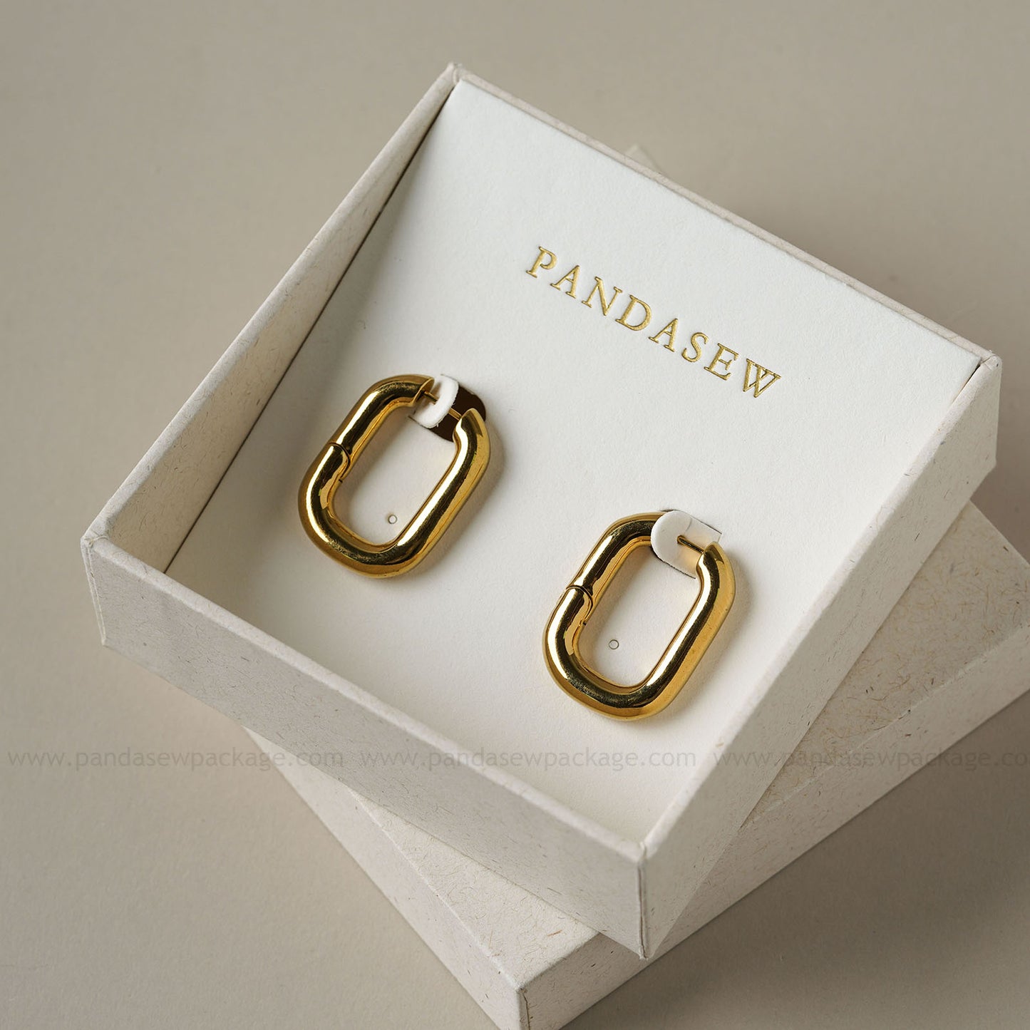 Pandasew earring cards deboss gold logo