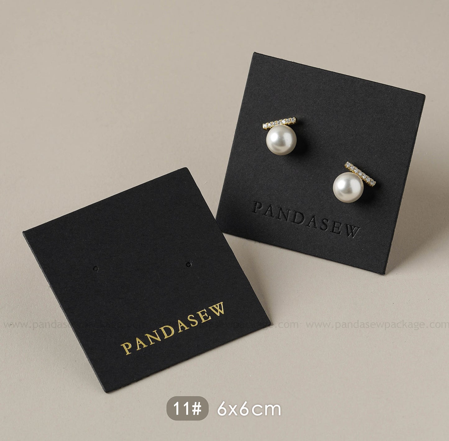 black earring cards deboss gold logo