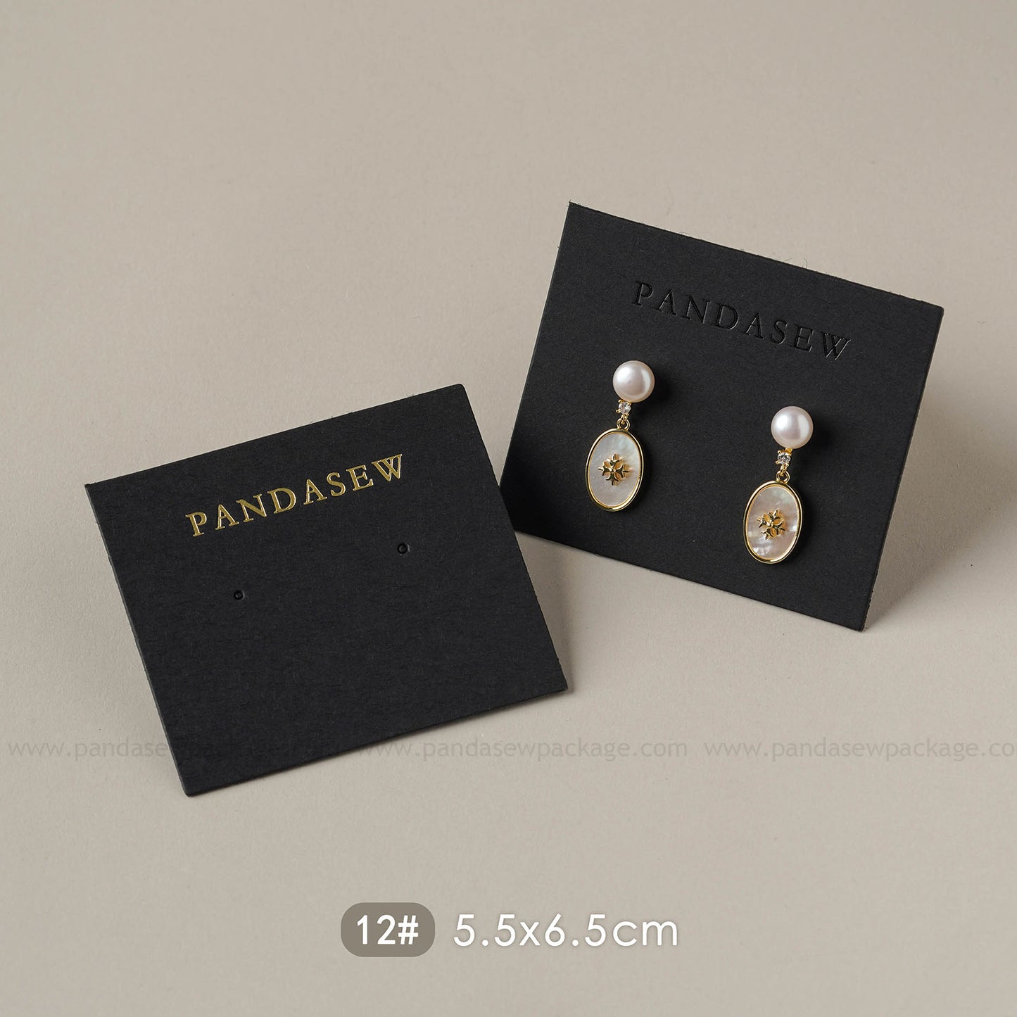 black earring cards deboss gold logo