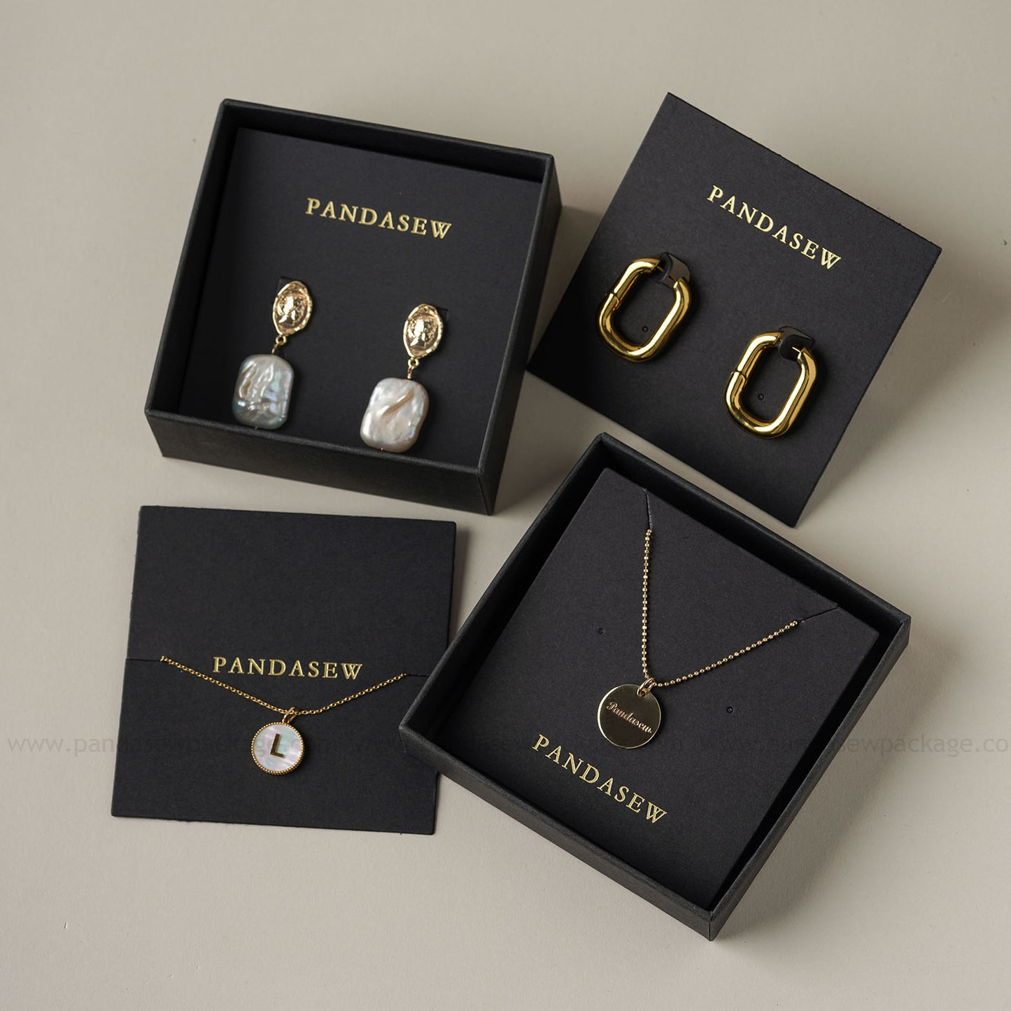 Pandasew earring cards deboss gold logo black
