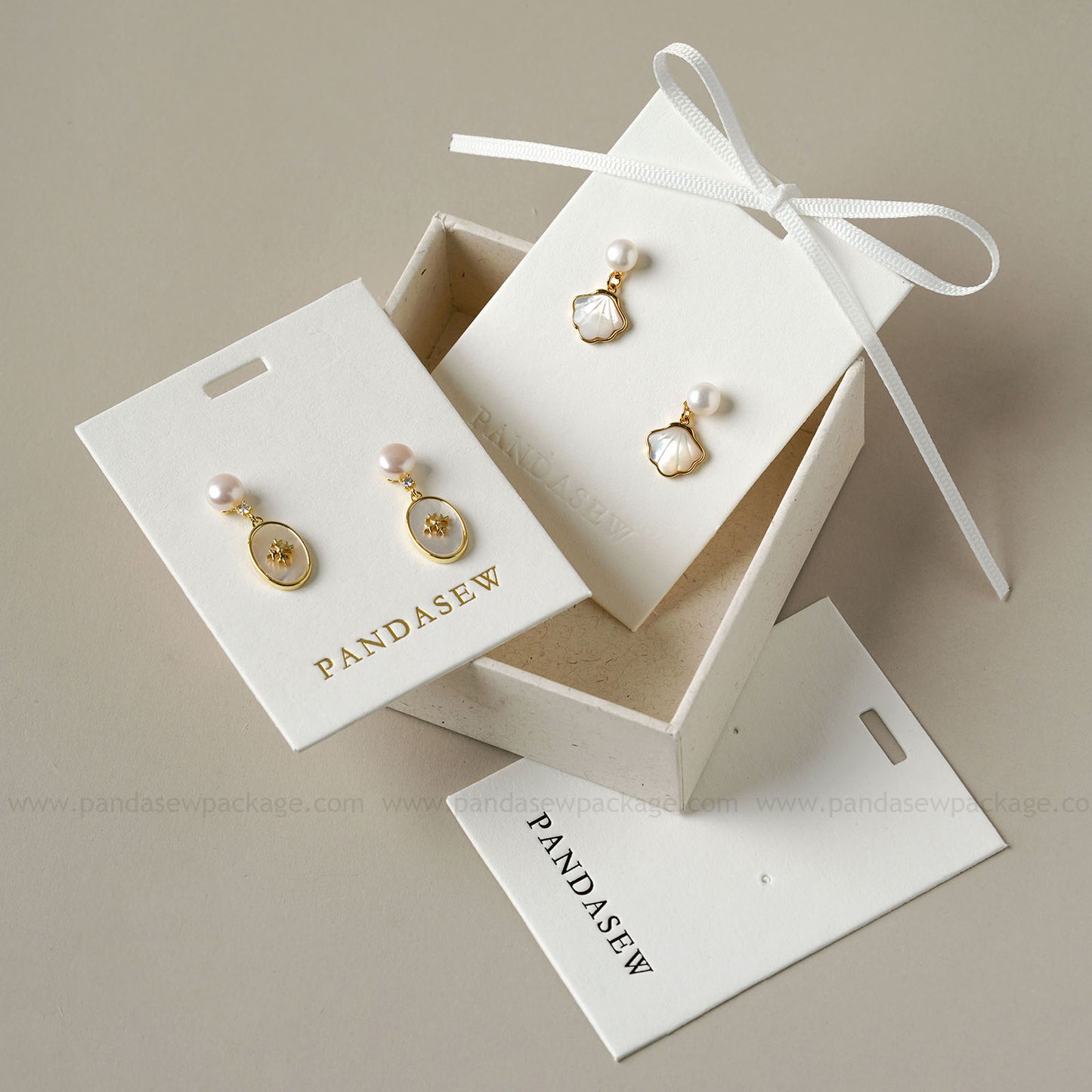 Pandasew earring cards deboss gold logo