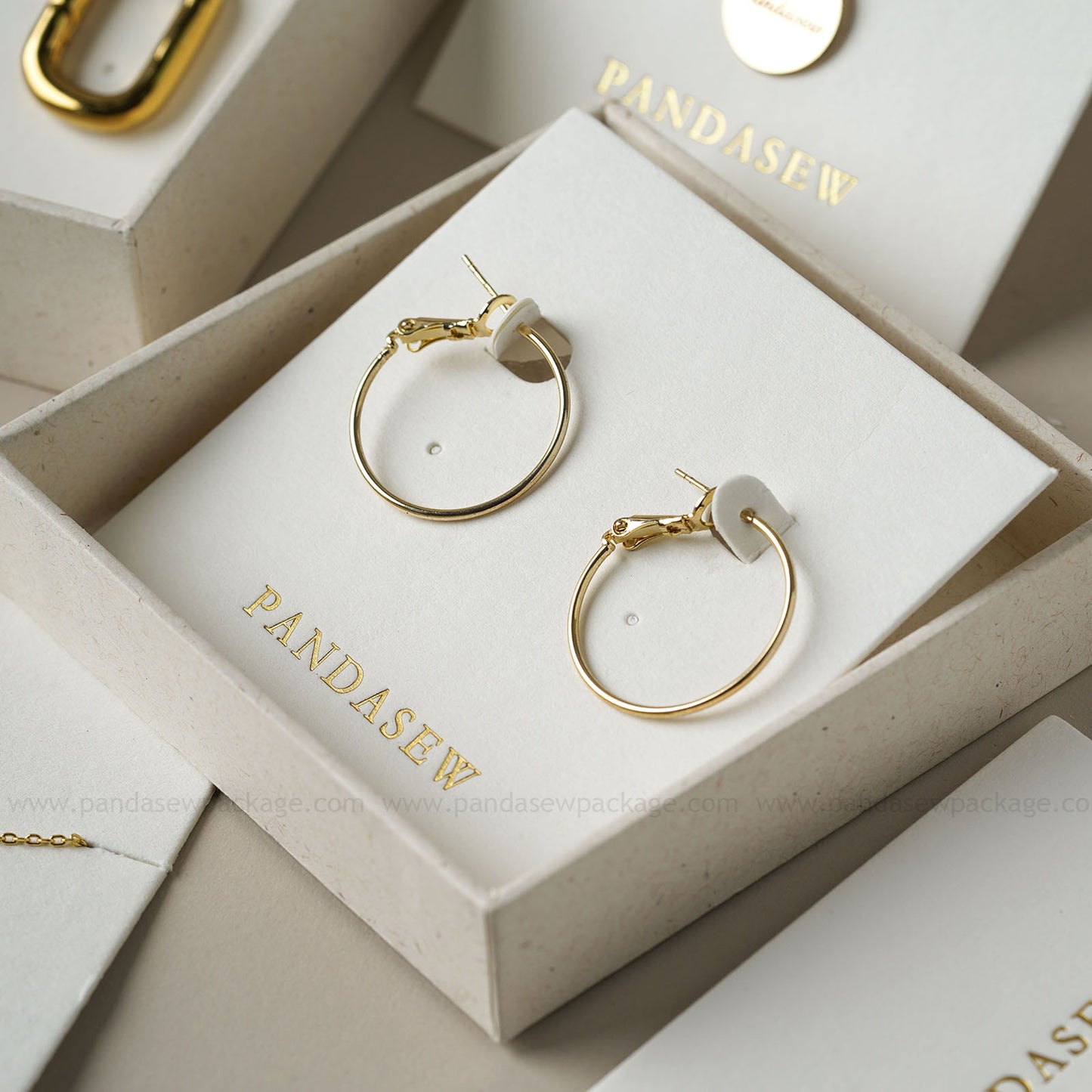 Pandasew earring cards deboss gold logo