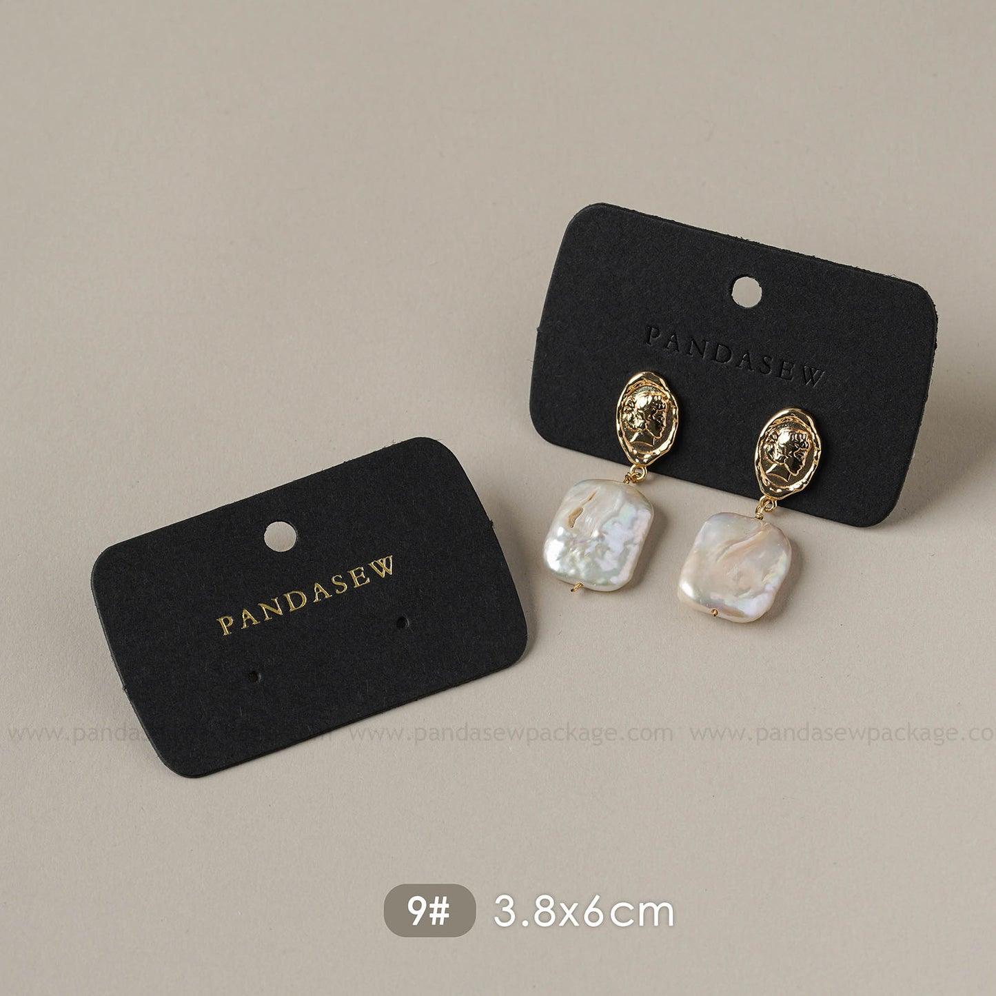 black earring cards deboss gold logo