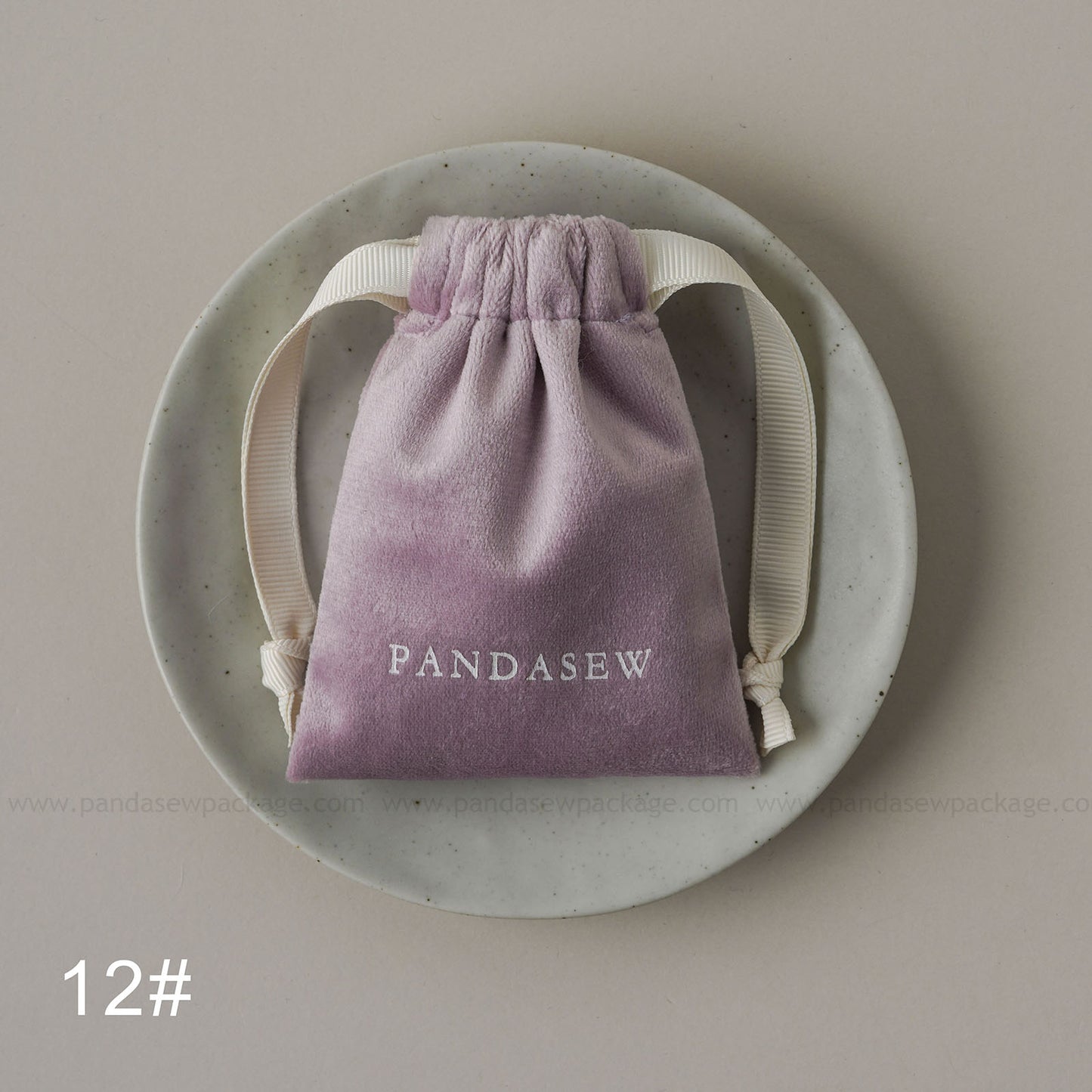 Purple velvet drawstring Pandasew bag. Aromatherapy/jewelry storage with custom logo