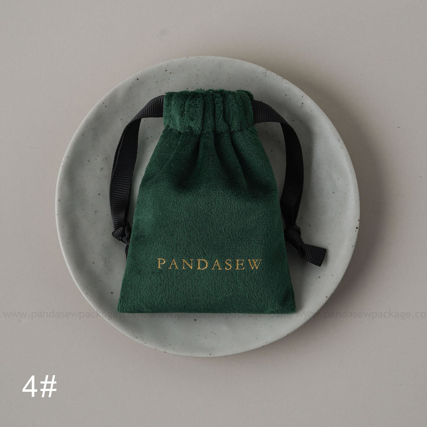 Dark green velvet drawstring Pandasew bag. Aromatherapy/jewelry storage with custom logo