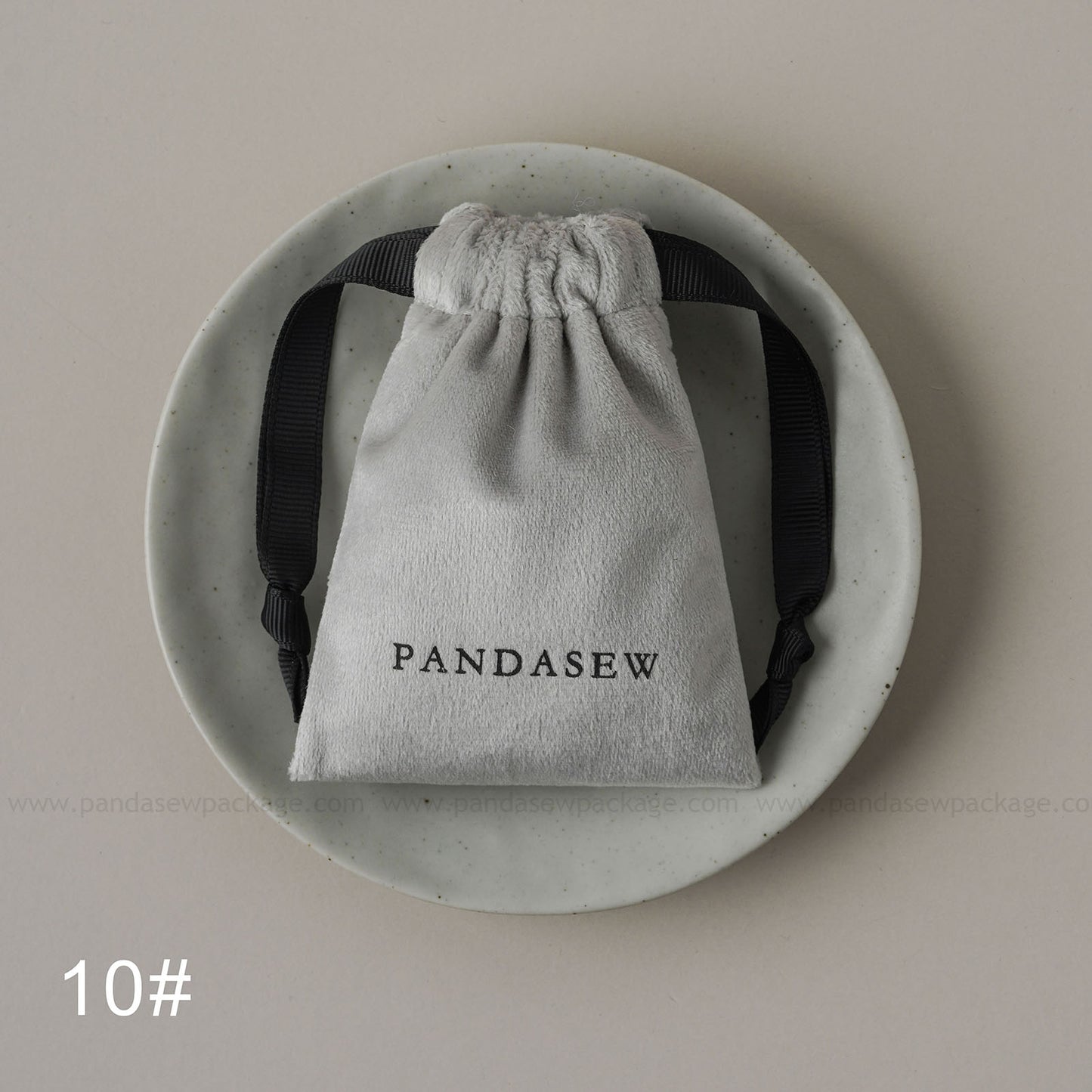 Gray velvet drawstring Pandasew bag. Aromatherapy/jewelry storage with custom logo