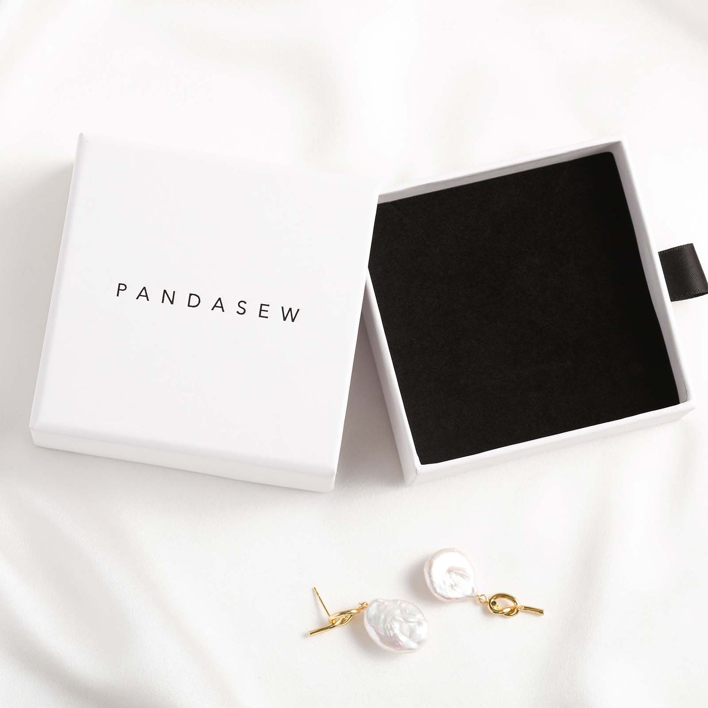 white jewelry gift box with black pull