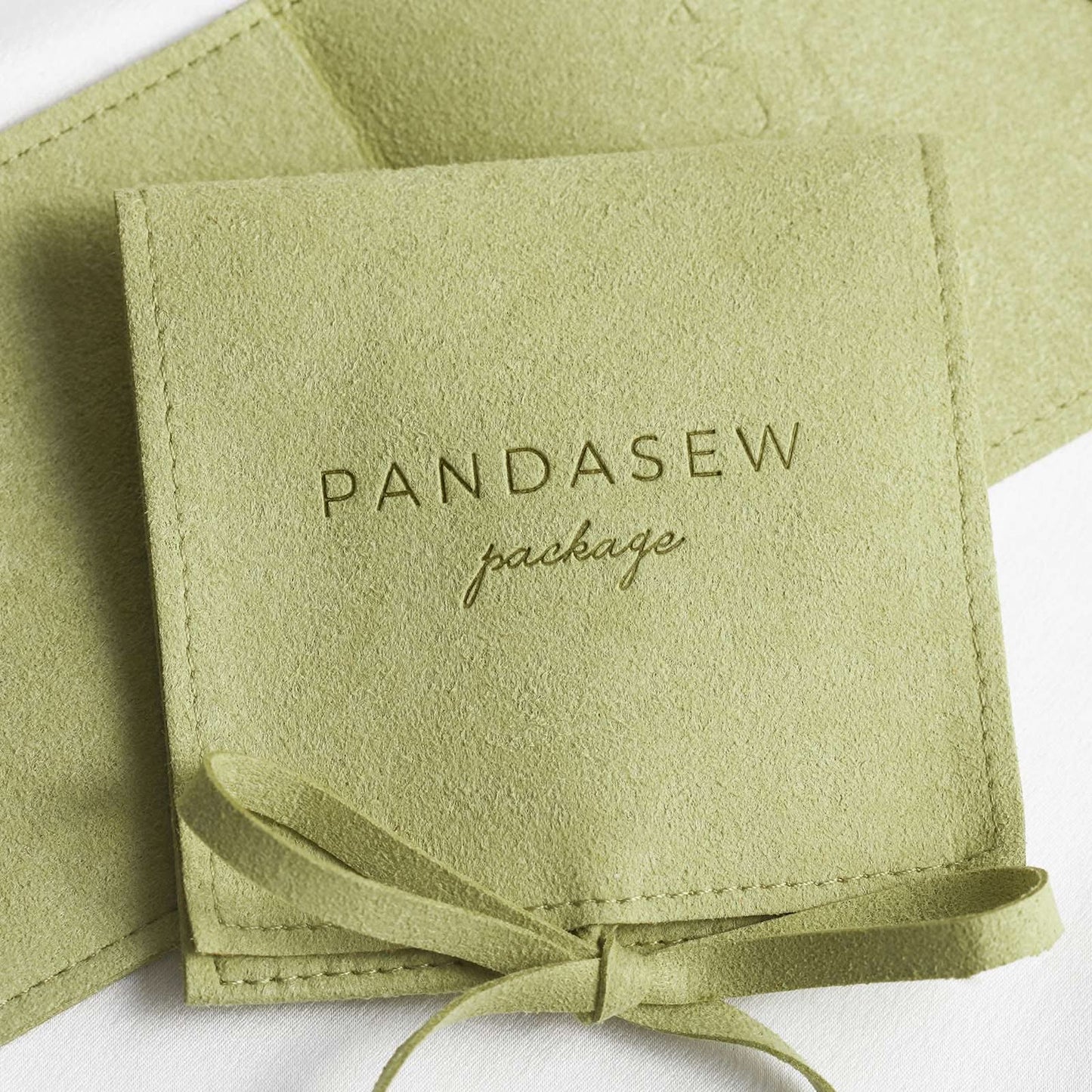 green microfiber jewelry pouch envelope style with string