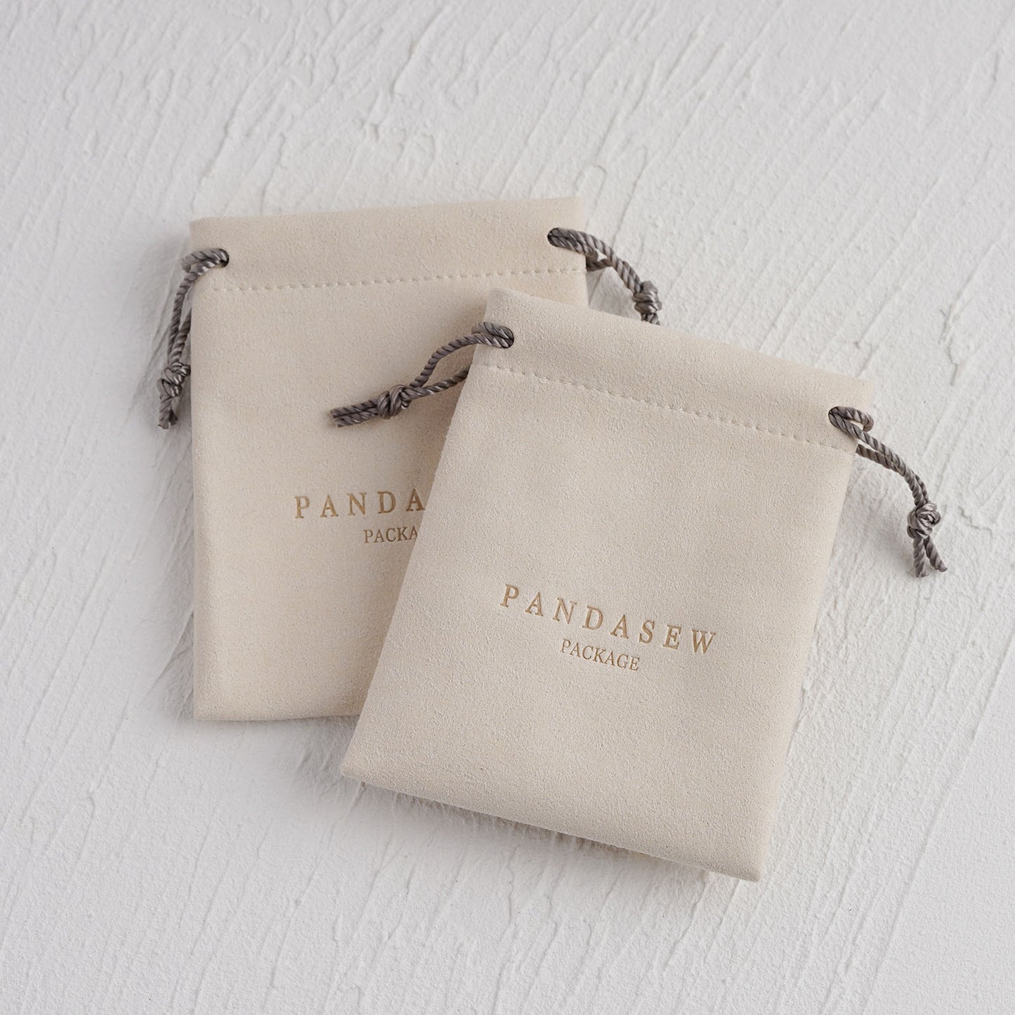 general top drawstring microfiber bag, beige color branded color pouch