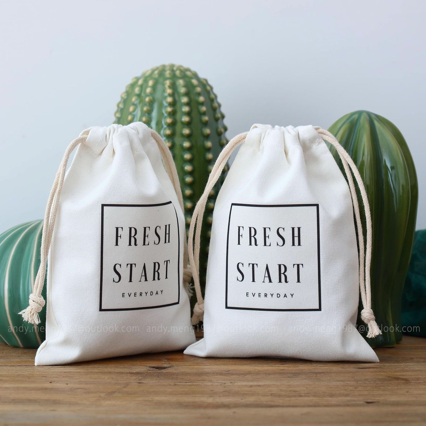 personalized logo white cotton canvas bags with black logo and cotton ropes
