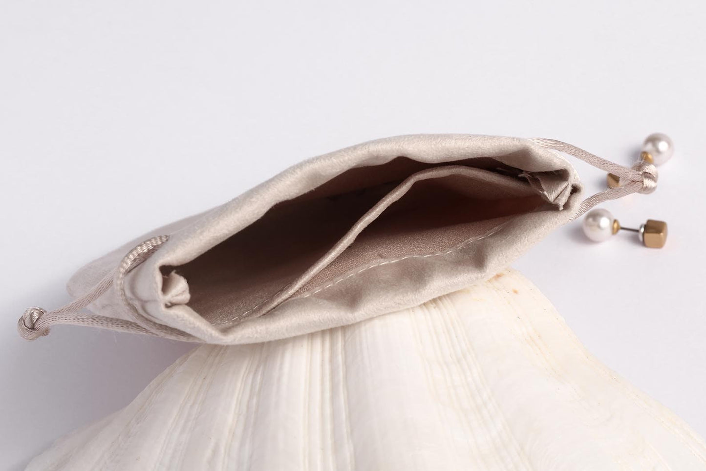 divider inside flannel pouch for small jewelry