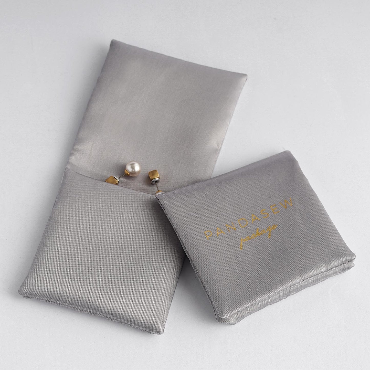 Glossy and thicker layers satin pouch