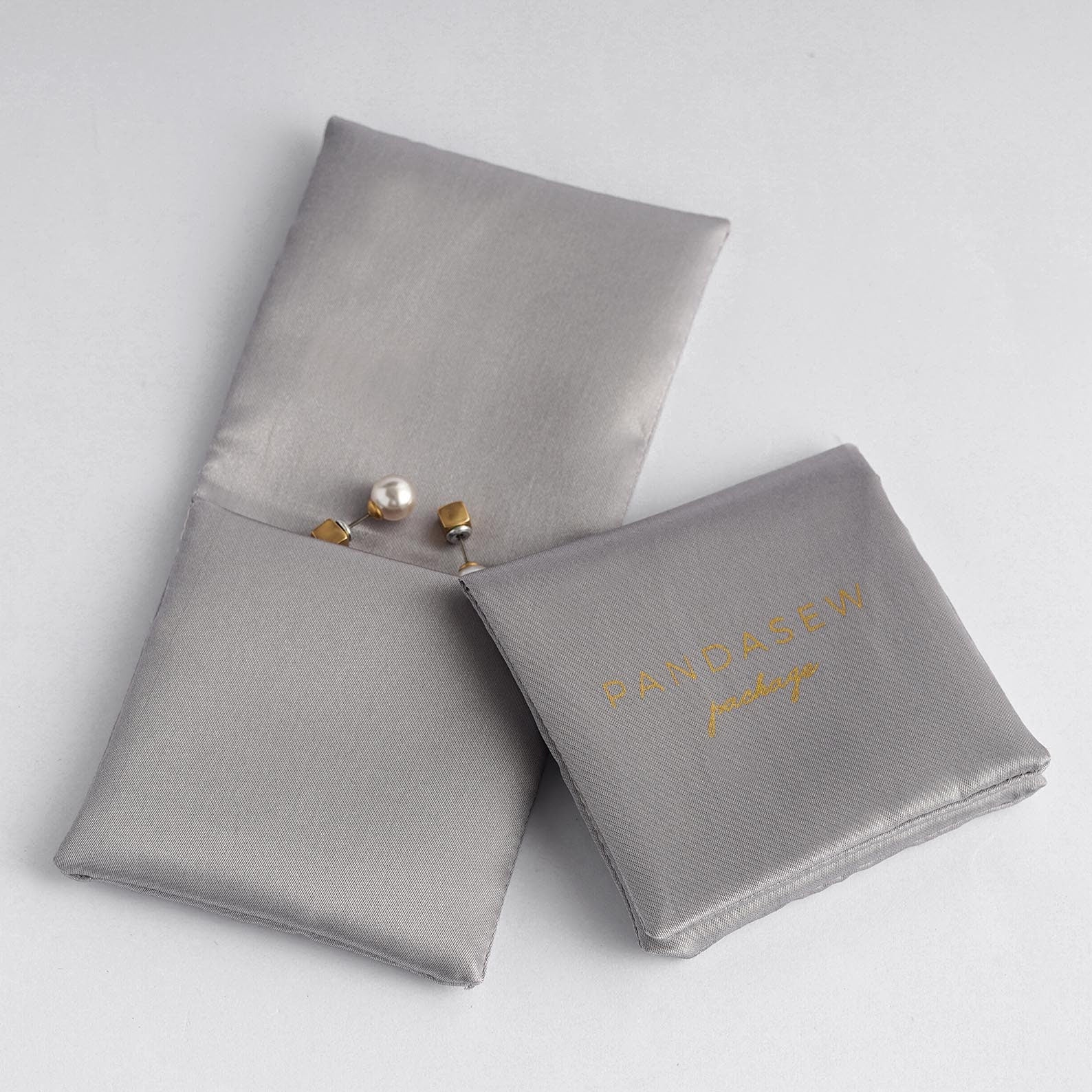 Glossy and thicker layers satin pouch