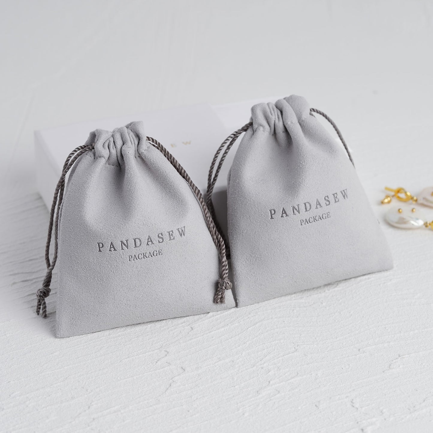 Gray microfiber drawstring pouch
