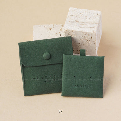 green style F button bag with green jewelry pad