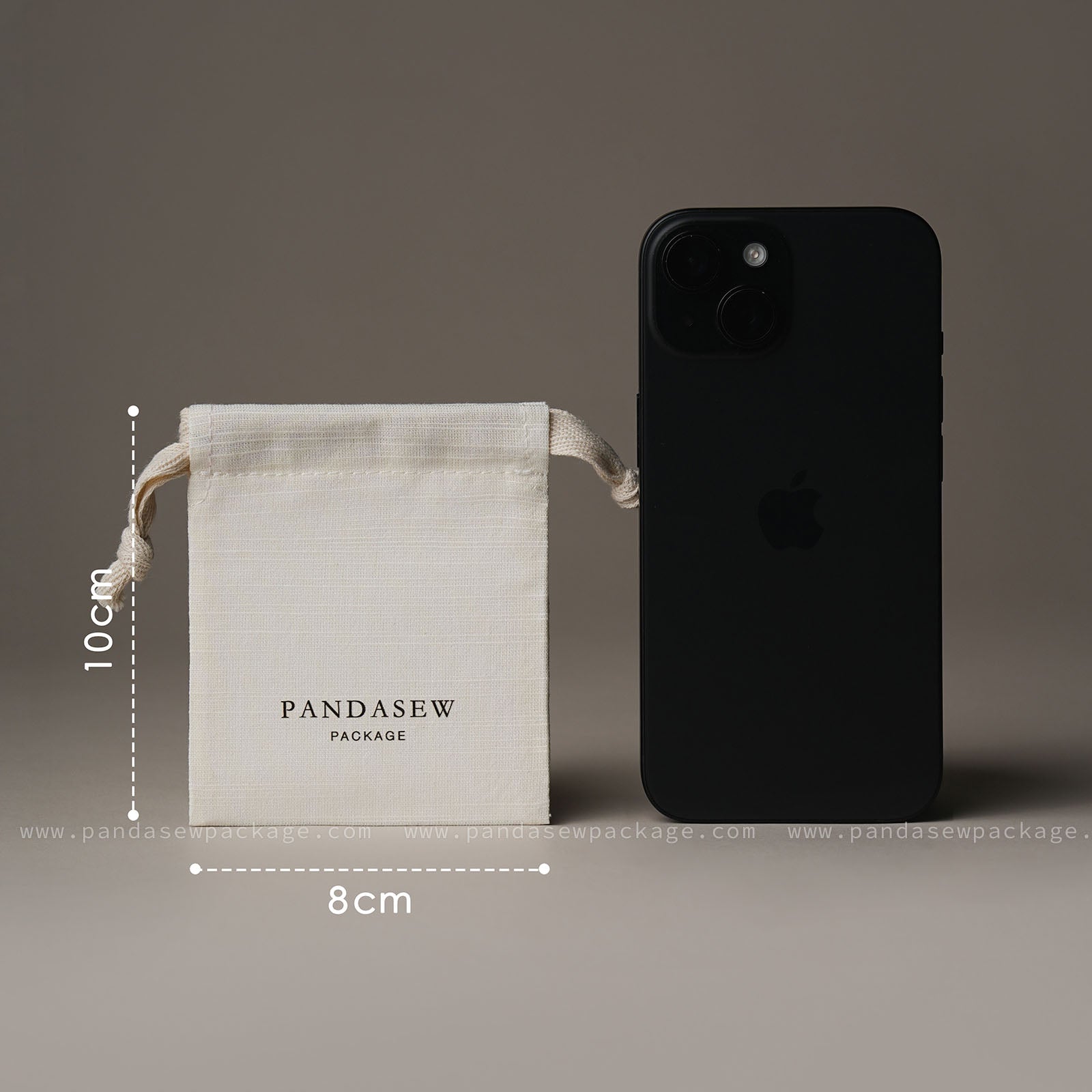 Size reference photo. Small 8x10cm jewelry pouch shown next to an iPhone for scale comparison.