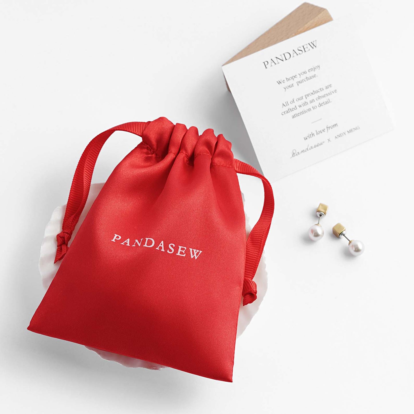red satin drastring bag custom packaging