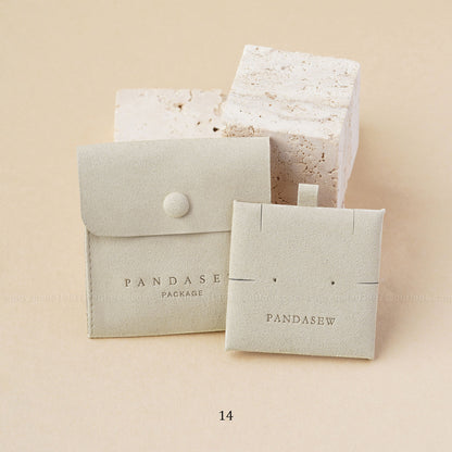 sand style F button pouch with necklace and earring insert pad