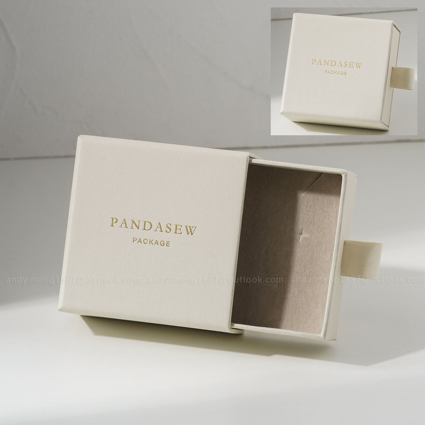 Sand jewelry box with custom gold logo