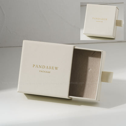 Sand jewelry box with custom gold logo
