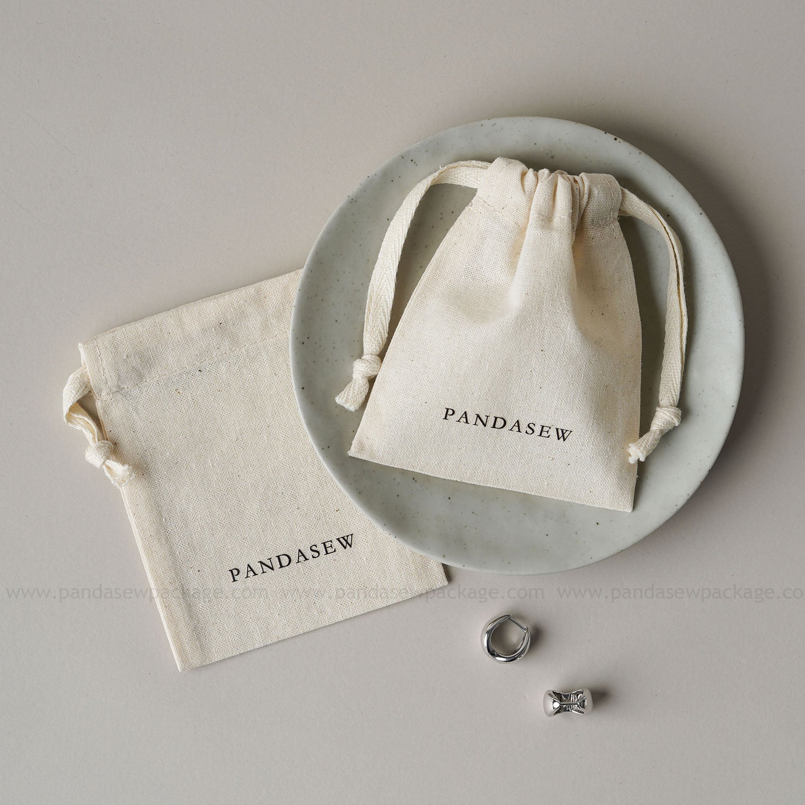 PANDASIEW Handmade jewelry presented in stylish, reusable cotton bags. Perfect for jewelry lovers, gift pack