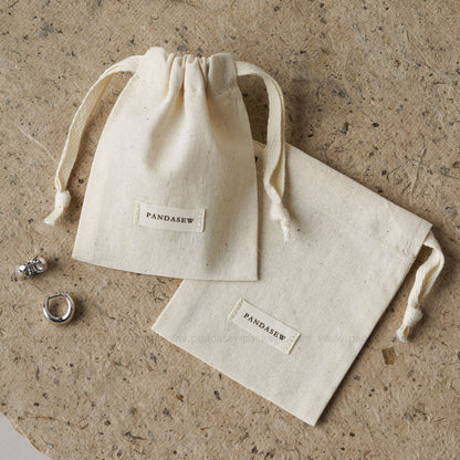 the perfect cotton drawstring bag, candles, skin care and soap bag