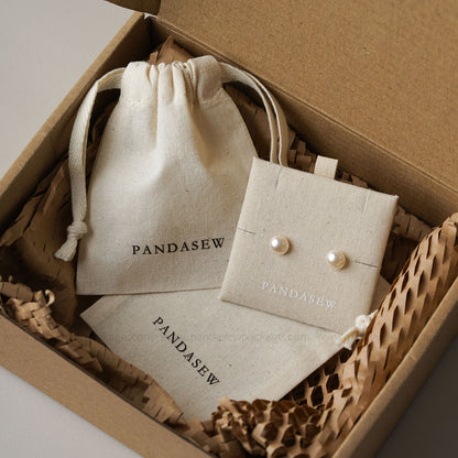 PANDASEW Elegant jewelry set in sustainable cotton pouches. Ideal for gifting or personal use, eco-friendly earrings packaging