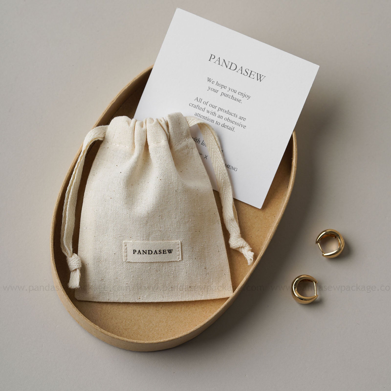 PANDASIEW Handmade jewelry presented in stylish, reusable cotton bags. Perfect for jewelry lovers, gift pack