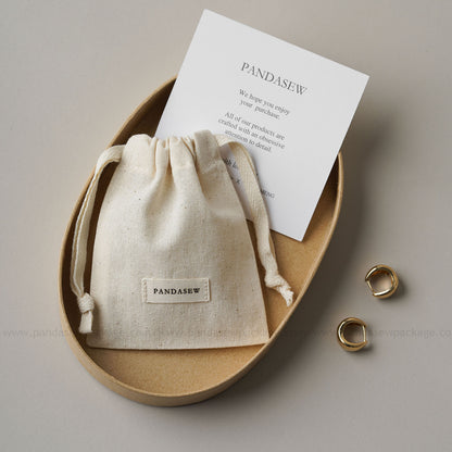 PANDASIEW Handmade jewelry presented in stylish, reusable cotton bags. Perfect for jewelry lovers, gift pack