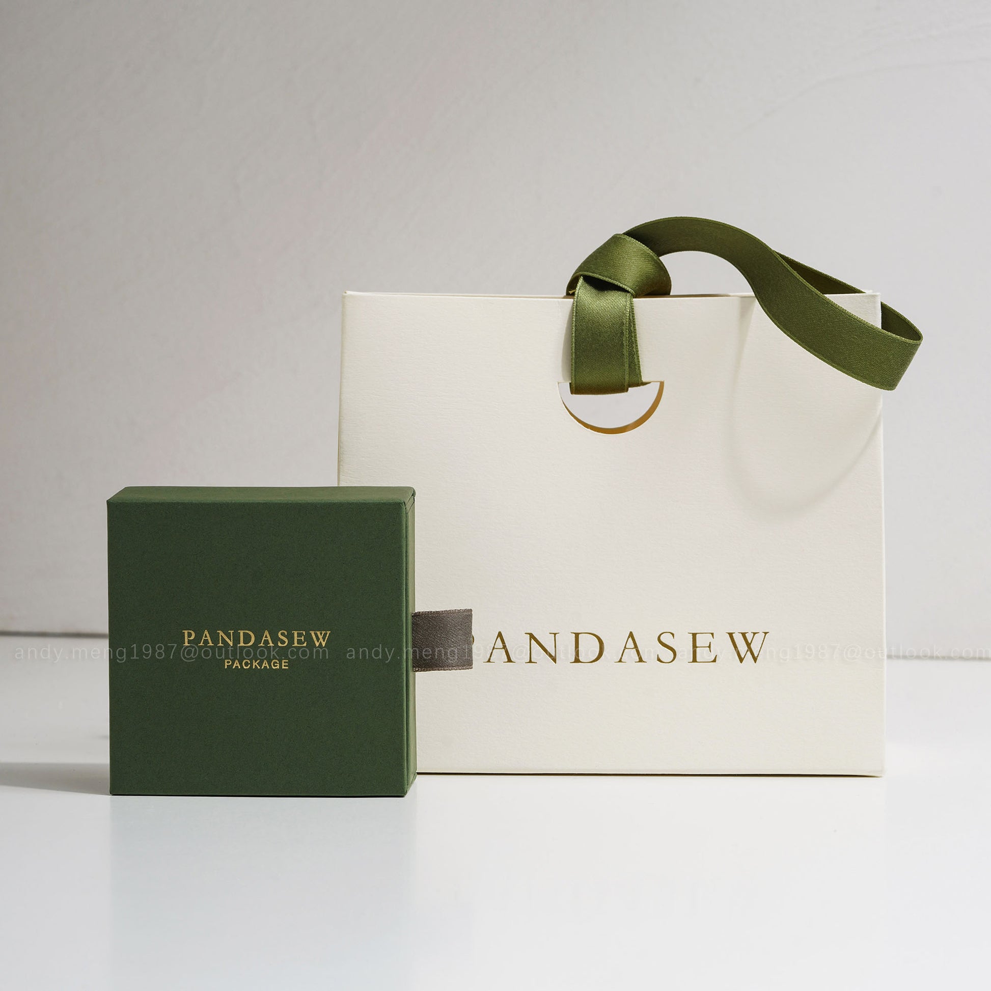 green jewelry box with cream paper bag package set