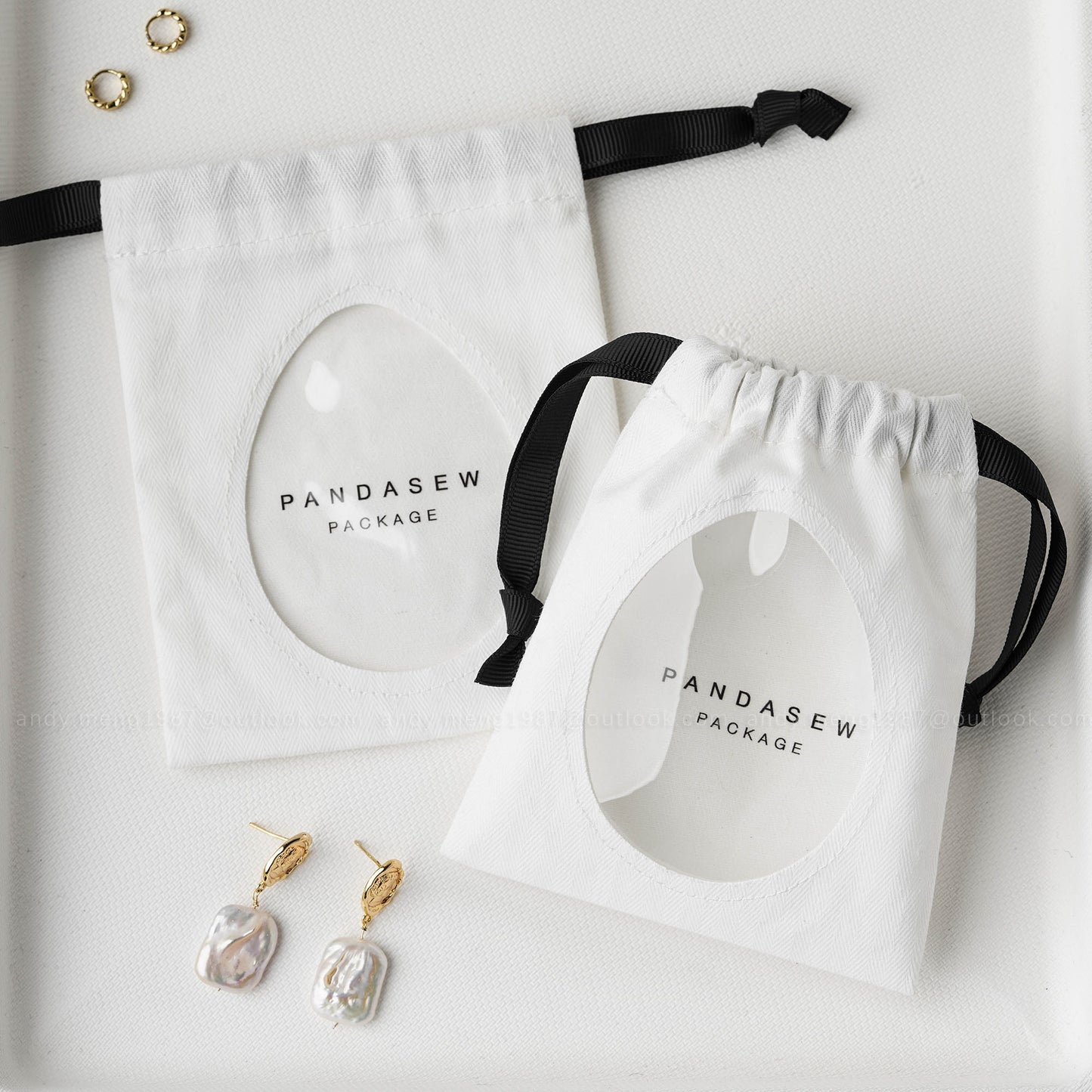 Cotton jewelry drawstring bag with custom logo and ribbon closure, suitable for earrings and bracelets, showcased by Pandasew Package