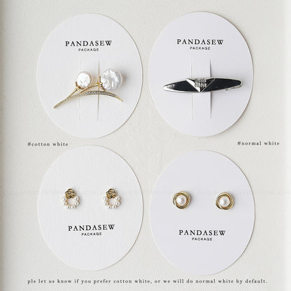 Pandasew custom jewelry on display cards showcasing various earring styles for packaging options
