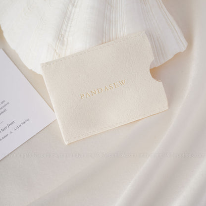 cream color microfiber card case