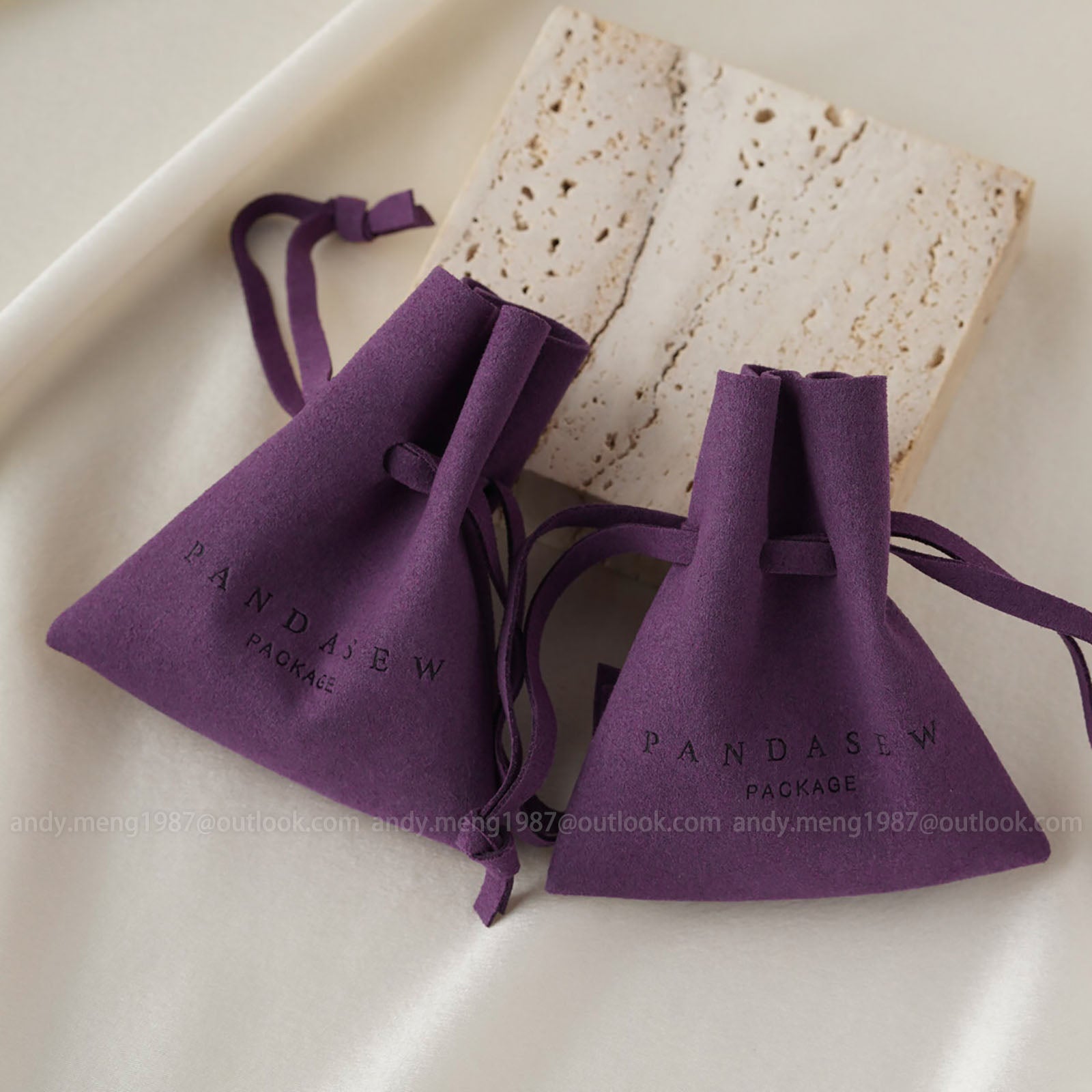 dark purple pouch, jewelry bag