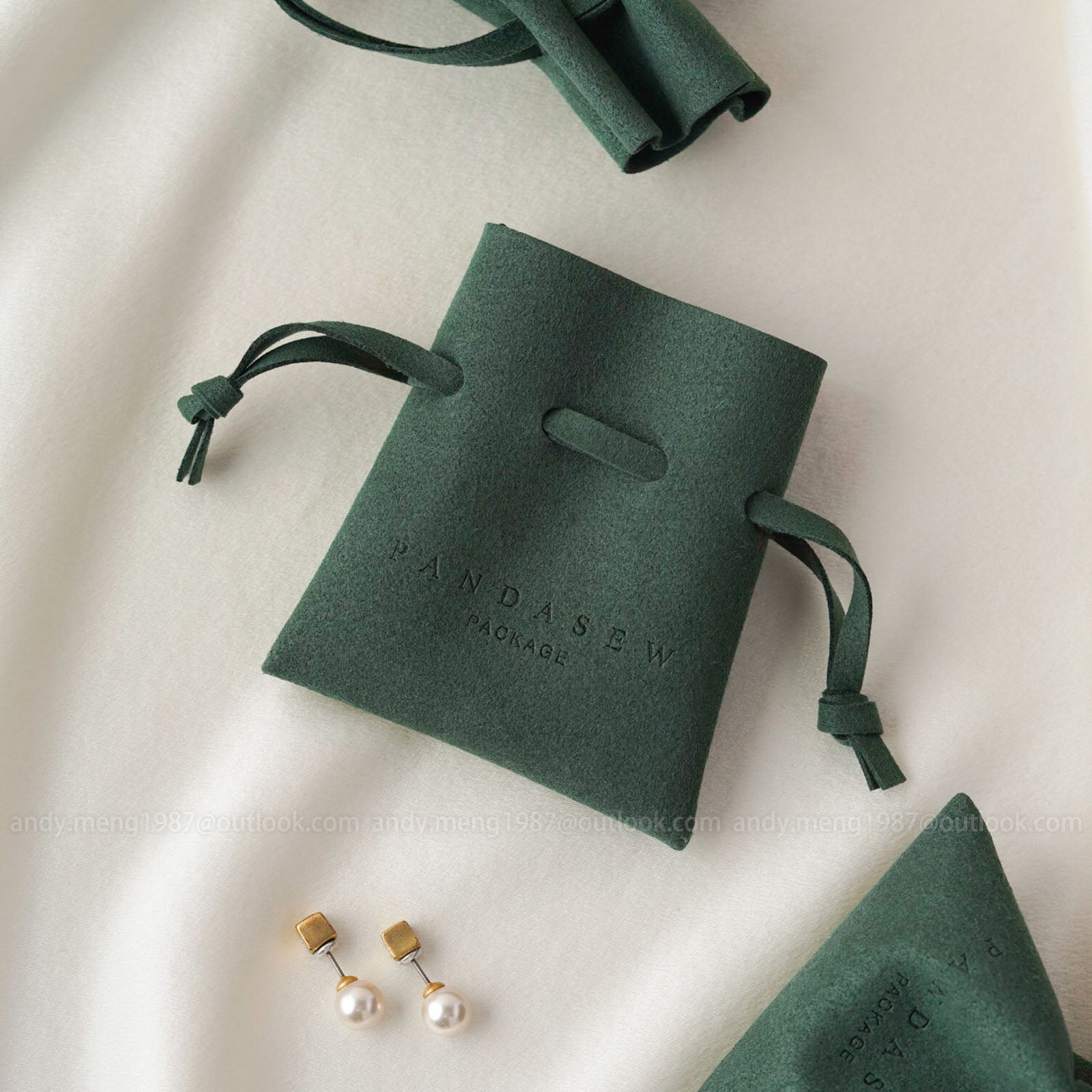 Green chic microfiber pouch. The green is dark, like Viridian.