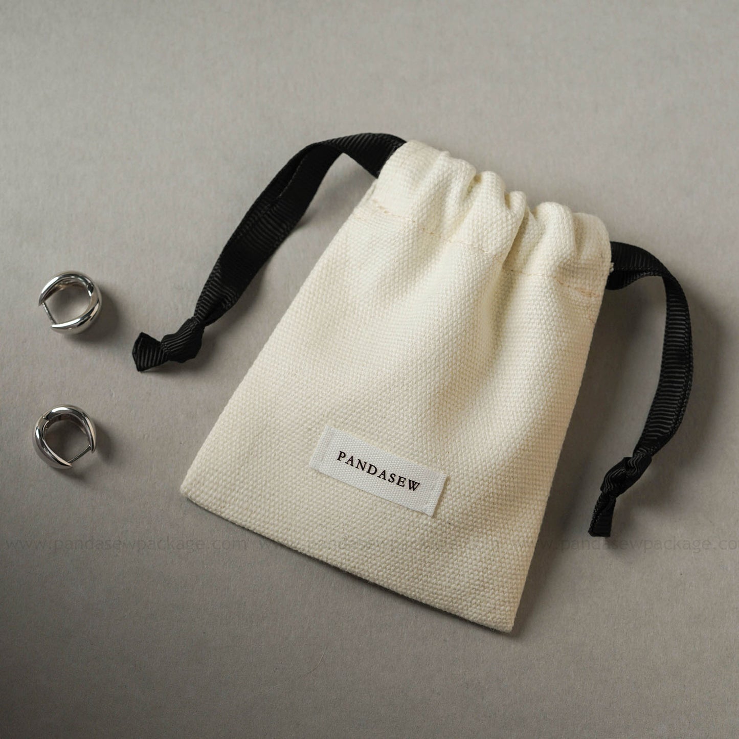 personalized beige canvas bag with white label, very thick cloth bag