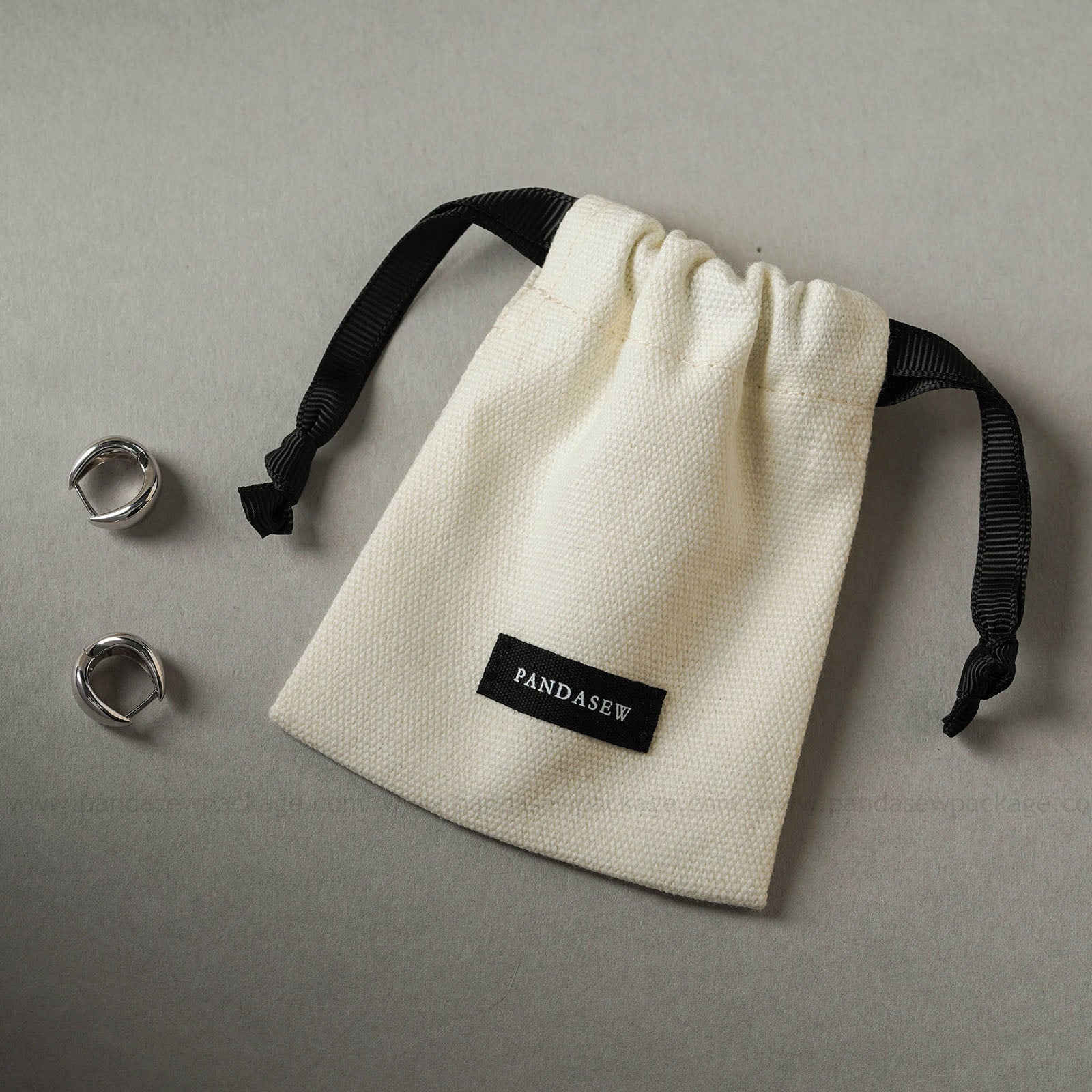 personalized beige canvas bag with black label, very thick cloth bag